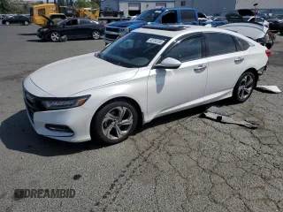 2018 Honda Accord EX with VIN 1HGCV1F4XJA018601, listed as a Copart auction lot 63795785 with 114,296 mi miles and Salvage title. Bid and sale history available at DreamBid. Image 1.