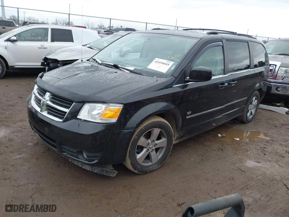 2009 Dodge Grand Caravan SXT with VIN 2D8HN54X39R672728, listed as a IAAI auction lot 41694045 with 184,594 mi miles. Bid and sale history available at carsss.com. Image 18.