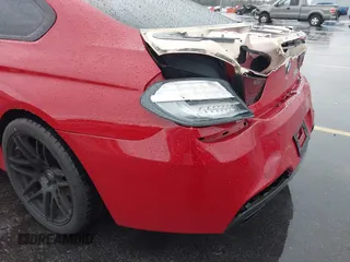 2013 BMW 6 Series 650i with VIN WBAYM9C53DDW20243, listed as a IAAI auction lot 41762838 with 100,905 mi miles and . Bid and sale history available at carsss.com. Image 20.
