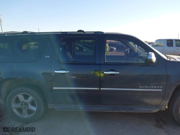 2011 Chevrolet Suburban LTZ with VIN 1GNSCKE00BR353106, listed as a IAAI auction lot 41393001 with 252,968 mi miles. Bid and sale history available at carsss.com. Image 13.