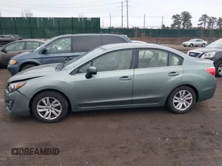 2015 Subaru Impreza Premium z VIN JF1GJAC65FH019578, wystawiony jako IAAI lot #41675318 z przebiegiem 74 769 mil mil oraz . Historia ofert i sprzedaży dostępna na DreamBid. Obrazek 14.