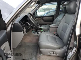 2004 Toyota Land Cruiser with VIN JTEHT05J242065384, listed as a Copart auction lot 83311194 with 132,495 mi miles and Salvage Title. Bid and sale history available at carsss.com. Image 7.