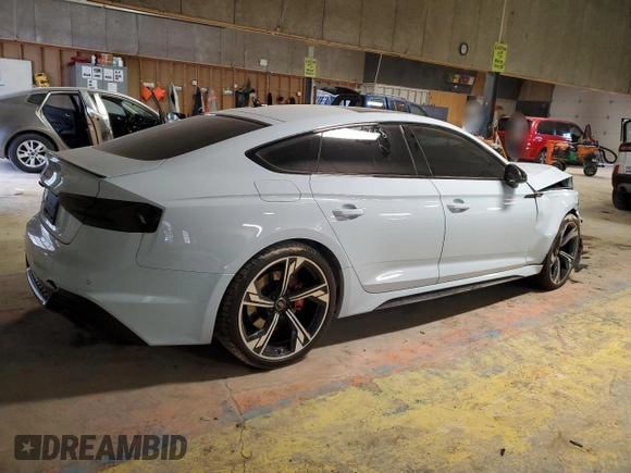 2023 Audi RS 5 Sportback z VIN WUAAWCF5XPA901858, wystawiony jako Copart lot #42140035 z przebiegiem Nie podano mil oraz Szkoda całkowita • Salvage title. Historia ofert i sprzedaży dostępna na DreamBid. Obrazek 3.