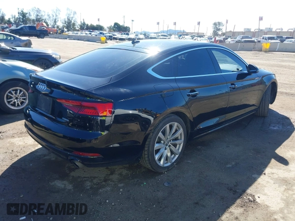 2018 Audi A5 Sportback Premium z VIN WAUANCF53JA009200, wystawiony jako IAAI lot #41725501 z przebiegiem 107 076 mil mil oraz . Historia ofert i sprzedaży dostępna na DreamBid. Obrazek 4.