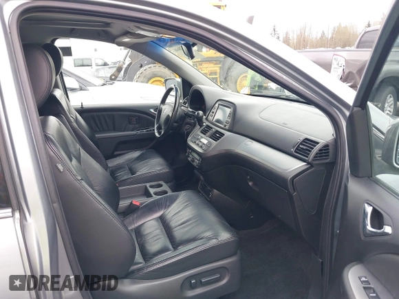 2008 Honda Odyssey Touring with VIN 5FNRL38908B098771, listed as a IAAI auction lot 41878646 with 167,834 mi miles. Bid and sale history available at carsss.com. Image 5.