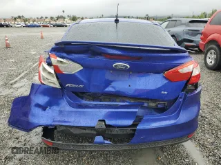2013 Ford Focus SE with VIN 1FADP3F24DL164398, listed as a Copart auction lot 54579505 with 157,880 mi miles and Salvage title. Bid and sale history available at DreamBid. Image 6.