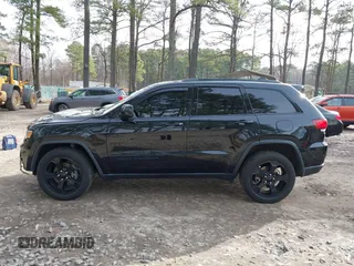 2018 Jeep Grand Cherokee Laredo E with VIN 1C4RJFAG1JC426542, listed as a IAAI auction lot 41729268 with 106,024 mi miles and . Bid and sale history available at DreamBid. Image 15.
