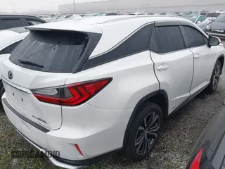 2022 Lexus RX with VIN JTJHGKFA6N2027366, listed as a IAAI auction lot 41193809 with 110,528 mi miles. Bid and sale history available at carsss.com. Image 4.