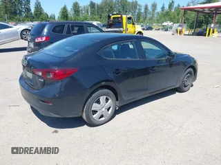 2015 Mazda 3 i Sport z VIN JM1BM1U74F1239306, wystawiony jako IAAI lot #42353133 z przebiegiem 150 051 mil mil oraz . Historia ofert i sprzedaży dostępna na DreamBid. Obrazek 4.