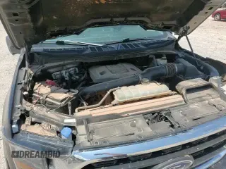 2023 Ford F-150 XL с VIN 1FTEW1C88PKD35713, выставлен на аукционе Copart как лот 65885345 с пробегом 63 148 миль миль и Списание • Salvage title. История ставок и продаж доступна на DreamBid. Изображение 14.