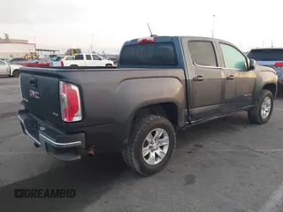 2016 GMC Canyon 2WD SLE with VIN 1GTG5CE30G1301490, listed as a IAAI auction lot 41409489 with 109,618 mi miles. Bid and sale history available at carsss.com. Image 4.