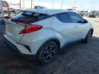 2018 Toyota C-HR XLE with VIN NMTKHMBX9JR022921, listed as a IAAI auction lot 41858651 with 50,448 mi miles. Bid and sale history available at carsss.com. Image 4.