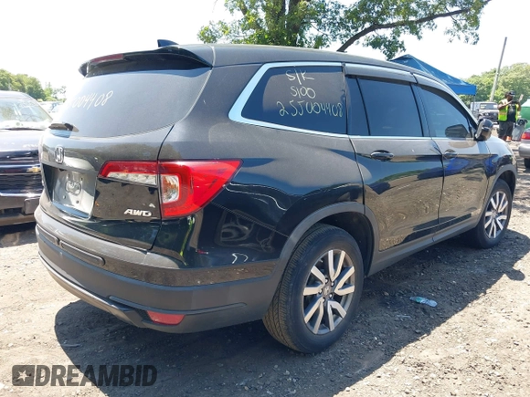 2019 Honda Pilot EX-L with VIN 5FNYF6H52KB006469, listed as a IAAI auction lot 42103135 with 12,757 mi miles and . Bid and sale history available at DreamBid. Image 4.