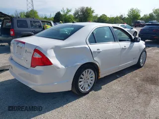 2012 Ford Fusion Hybrid with VIN 3FADP0L38CR255511, listed as a IAAI auction lot 42381063 with 82,083 mi miles and . Bid and sale history available at DreamBid. Image 4.