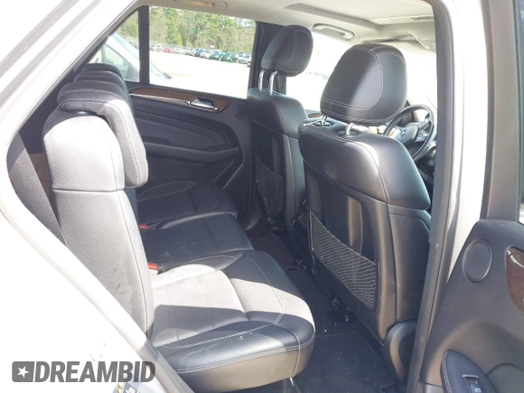 2014 Mercedes-Benz M 350 with VIN 4JGDA5HB4EA371774, listed as a IAAI auction lot 42079843 with 128,448 mi miles and . Bid and sale history available at DreamBid. Image 8.