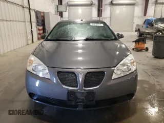 2008 Pontiac G6 z VIN 1G2ZG57B084103452, wystawiony jako Copart lot #59618015 z przebiegiem 143 058 mil mil oraz Szkoda całkowita • Salvage title. Historia ofert i sprzedaży dostępna na DreamBid. Obrazek 5.
