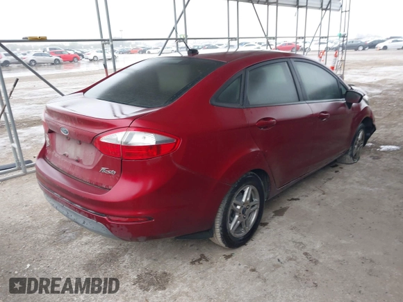 2017 Ford Fiesta SE z VIN 3FADP4BJ9HM159284, wystawiony jako IAAI lot #41291003 z przebiegiem 79 668 mil mil oraz . Historia ofert i sprzedaży dostępna na DreamBid. Obrazek 4.