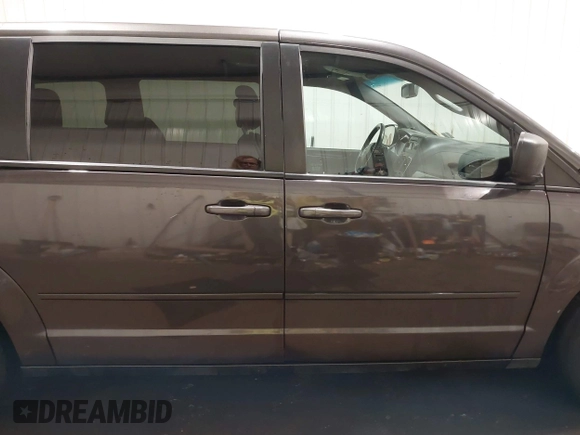 2016 Dodge Grand Caravan SE with VIN 2C4RDGBGXGR219689, listed as a IAAI auction lot 41675960 with 112,045 mi miles and . Bid and sale history available at DreamBid. Image 14.