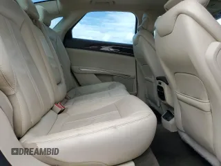 2015 Lincoln MKZ z VIN 3LN6L2J90FR601908, wystawiony jako Copart lot #55516355 z przebiegiem 127 487 mil mil oraz Szkoda całkowita • Salvage title. Historia ofert i sprzedaży dostępna na DreamBid. Obrazek 10.