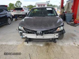 2023 Toyota Camry LE z VIN 4T1C11AK3PU719452, wystawiony jako IAAI lot #38236100 z przebiegiem 34 140 mil mil oraz . Historia ofert i sprzedaży dostępna na DreamBid. Obrazek 13.