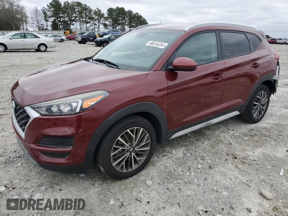 2019 Hyundai Tucson Sport with VIN KM8J33AL0KU875219, listed as a Copart auction lot 86816254 with 82,829 mi miles and Salvage Title. Bid and sale history available at carsss.com. Image 1.