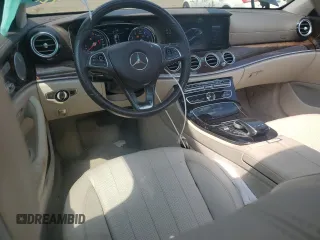 2017 Mercedes-Benz E 300 Luxury with VIN WDDZF4KBXHA185598, listed as a Copart auction lot 61011935 with 59,116 mi miles and Salvage title. Bid and sale history available at DreamBid. Image 8.