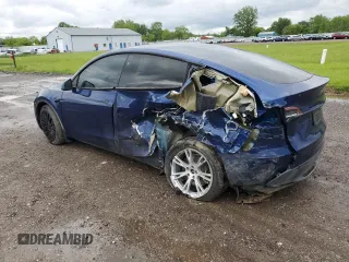 2024 Tesla Model Y Long Range z VIN 7SAYGDEE0RA286070, wystawiony jako Copart lot #58200425 z przebiegiem 16 881 mil mil oraz Szkoda całkowita • Salvage title. Historia ofert i sprzedaży dostępna na DreamBid. Obrazek 2.