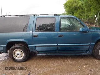 1995 GMC Suburban with VIN 1GDFK16K8SJ741041, listed as a IAAI auction lot 42315676 with 159,312 mi miles and . Bid and sale history available at DreamBid. Image 13.