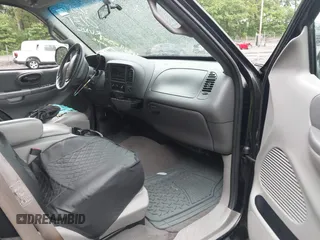 2000 Ford F-150 XL z VIN 1FTRX17L2YNB60131, wystawiony jako IAAI lot #42295537 z przebiegiem 216 638 mil mil oraz . Historia ofert i sprzedaży dostępna na DreamBid. Obrazek 5.