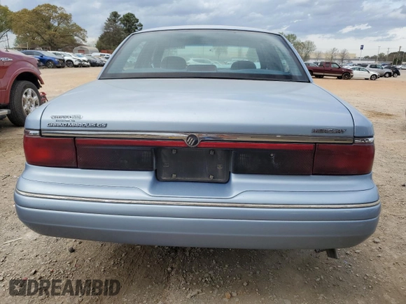 1997 Mercury Grand Marquis GS z VIN 2MELM74W2VX642879, wystawiony jako Copart lot #51464035 z przebiegiem 117 860 mil mil oraz Szkoda całkowita • Salvage title. Historia ofert i sprzedaży dostępna na DreamBid. Obrazek 6.