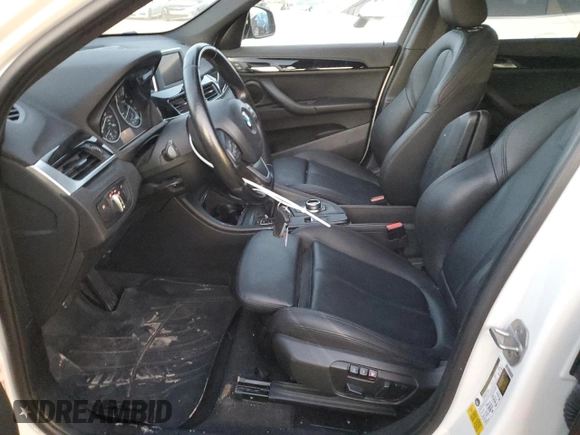 2017 BMW X1 sDrive28i with VIN WBXHU7C37H5H34418, listed as a Copart auction lot 47982795 with 67,980 mi miles and Salvage Title. Bid and sale history available at carsss.com. Image 7.