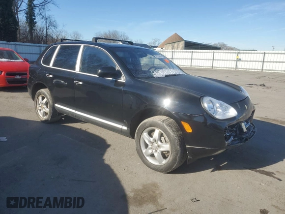 2004 Porsche Cayenne S with VIN WP1AB29P74LA73816, listed as a Copart auction lot 85230694 with 100,233 mi miles and Salvage Title. Bid and sale history available at carsss.com. Image 4.