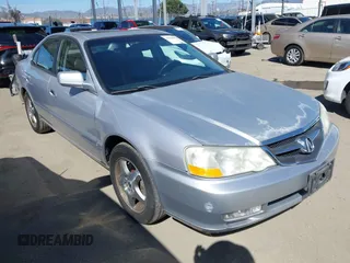 2002 Acura TL w/Navigation with VIN 19UUA56782A004182, listed as a IAAI auction lot 41838923 with 158,511 mi miles. Bid and sale history available at carsss.com. Image 1.
