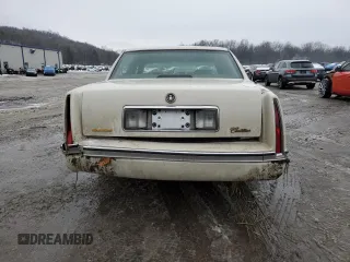 1995 Cadillac DeVille z VIN 1G6KD52B8SU274053, wystawiony jako Copart lot #86429934 z przebiegiem 100 496 mil mil oraz Szkoda całkowita • Salvage title. Historia ofert i sprzedaży dostępna na DreamBid. Obrazek 6.