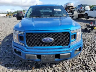 2019 Ford F-150 XL with VIN 1FTEX1EP2KKF20835, listed as a Copart auction lot 70089304 with 87,402 mi miles and Salvage title. Bid and sale history available at DreamBid. Image 5.