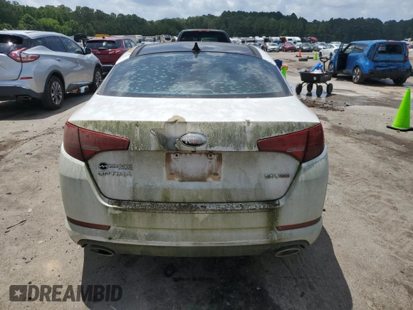 2013 Kia Optima EX z VIN 5XXGN4A72DG237404, wystawiony jako Copart lot #61293445 z przebiegiem 166 327 mil mil oraz Czysty tytuł • Clean title. Historia ofert i sprzedaży dostępna na DreamBid. Obrazek 6.