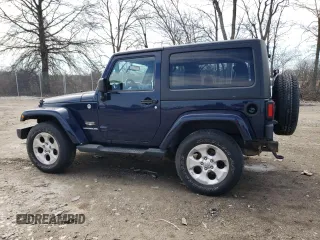 2013 Jeep Wrangler Sahara with VIN 1C4AJWBG3DL516842, listed as a Copart auction lot 49246065 with 129,594 mi miles and Salvage title. Bid and sale history available at DreamBid. Image 2.