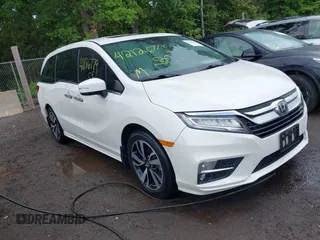 2018 Honda Odyssey Elite z VIN 5FNRL6H94JB008108, wystawiony jako IAAI lot #42126779 z przebiegiem 93 859 mil mil oraz . Historia ofert i sprzedaży dostępna na DreamBid. Obrazek 1.