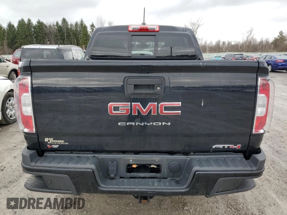 2022 GMC Canyon 4WD AT4 w/Leather with VIN 1GTG6FEN5N1279158, listed as a Copart auction lot 50958545 with 34,569 mi miles and Salvage Title. Bid and sale history available at carsss.com. Image 6.