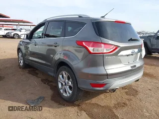 2014 Ford Escape Titanium with VIN 1FMCU0JX5EUC00297, listed as a IAAI auction lot 41928316 with 146,406 mi miles. Bid and sale history available at carsss.com. Image 3.