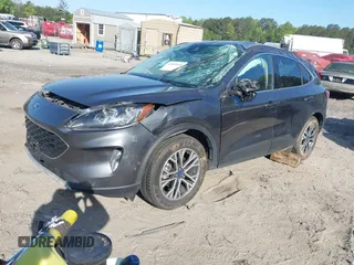 2020 Ford Escape Titanium Hybrid with VIN 1FMCU9DZ2LUA86600, listed as a IAAI auction lot 42059830 with 76,998 mi miles and . Bid and sale history available at DreamBid. Image 2.