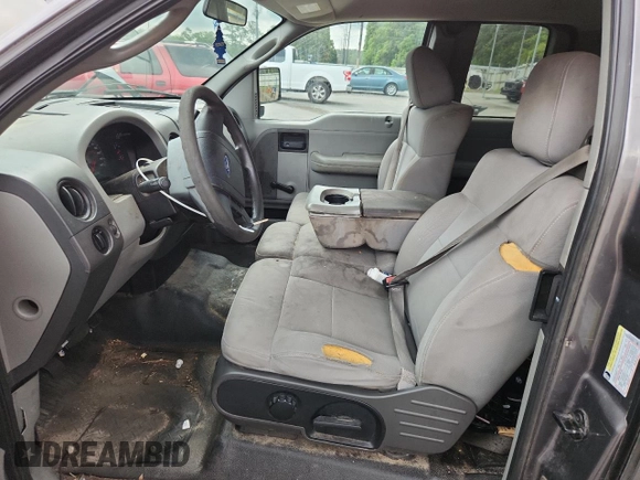 2005 Ford F-150 STX with VIN 1FTRX12W55FB32573, listed as a Copart auction lot 59602715 with 238,701 mi miles and Salvage title. Bid and sale history available at DreamBid. Image 7.