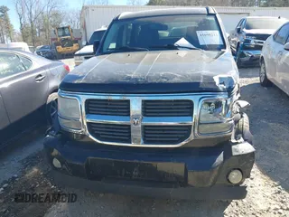 2007 Dodge Nitro SLT z VIN 1D8GU58K87W555759, wystawiony jako IAAI lot #41690213 z przebiegiem 196 779 mil mil oraz . Historia ofert i sprzedaży dostępna na DreamBid. Obrazek 12.