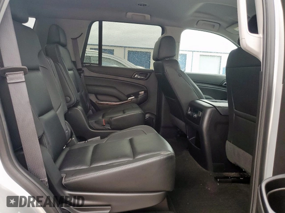 2018 Chevrolet Tahoe LT with VIN 1GNSCBKC1JR387830, listed as a Copart auction lot 60649755 with 59,649 mi miles and Salvage title. Bid and sale history available at DreamBid. Image 11.