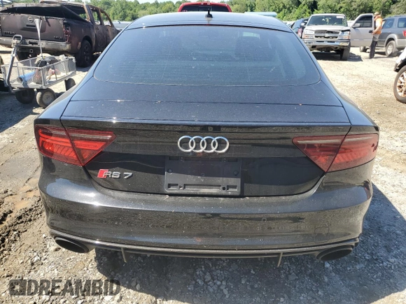 2017 Audi RS 7 Prestige z VIN WUAWAAFC6HN902717, wystawiony jako Copart lot #61811494 z przebiegiem 103 547 mil mil oraz Szkody całkowita. Historia ofert i sprzedaży dostępna na DreamBid. Obrazek 6.