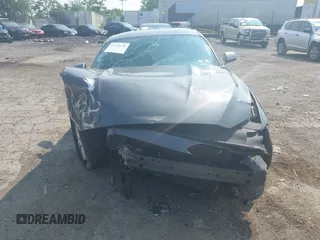2016 Ford Mustang V6 z VIN 1FA6P8AM7G5320991, wystawiony jako IAAI lot #42405138 z przebiegiem Nie podano mil oraz . Historia ofert i sprzedaży dostępna na DreamBid. Obrazek 11.