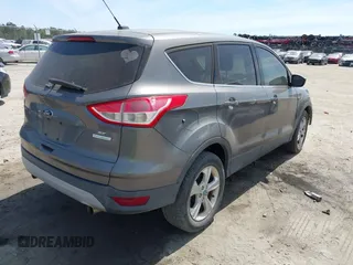 2013 Ford Escape SE with VIN 1FMCU0G93DUA21926, listed as a IAAI auction lot 41901699 with 174,456 mi miles and . Bid and sale history available at DreamBid. Image 4.