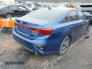 2021 Kia Forte LXS with VIN 3KPF24AD8ME397855, listed as a IAAI auction lot 41621426 with 157,000 mi miles. Bid and sale history available at carsss.com. Image 4.