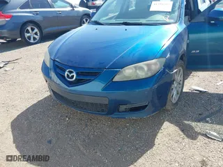 2007 Mazda Mazda3 s Touring with VIN JM1BK323171630318, listed as a IAAI auction lot 41750386 with 232,731 mi miles. Bid and sale history available at carsss.com. Image 6.