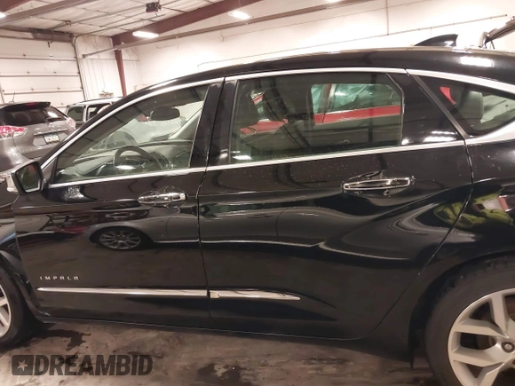 2017 Chevrolet Impala Premier with VIN 2G1145S39H9165231, listed as a IAAI auction lot 41874402 with 110,124 mi miles and . Bid and sale history available at DreamBid. Image 14.